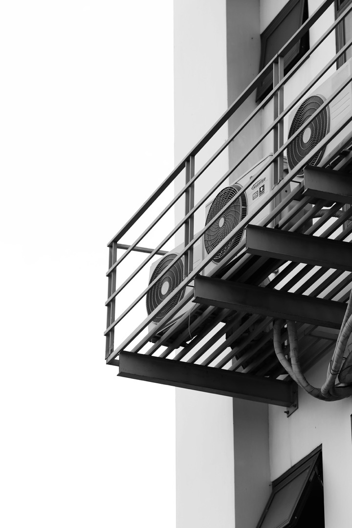 Energy-efficient ductless air conditioning units mounted on a building